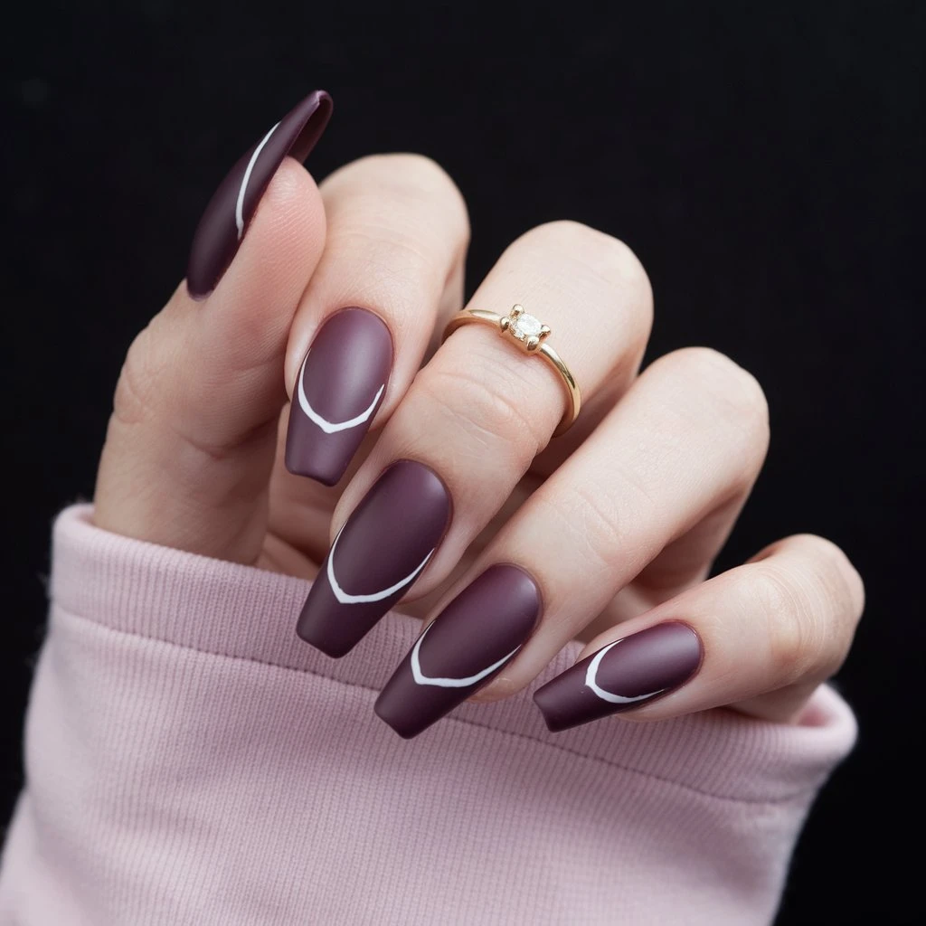 Deep Plum with Matte and Glossy Contrast nail design