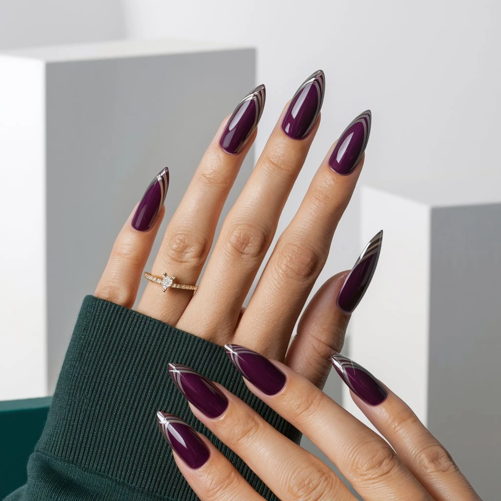 Glossy Eggplant with Metallic Stripes Nail design
